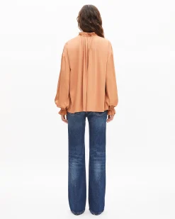 Blouse avec volants orange foncé