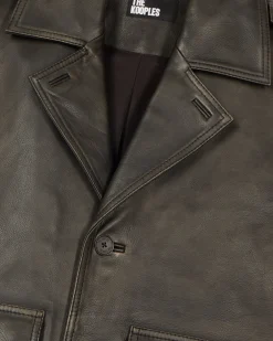 Blouson boutonné en cuir noir