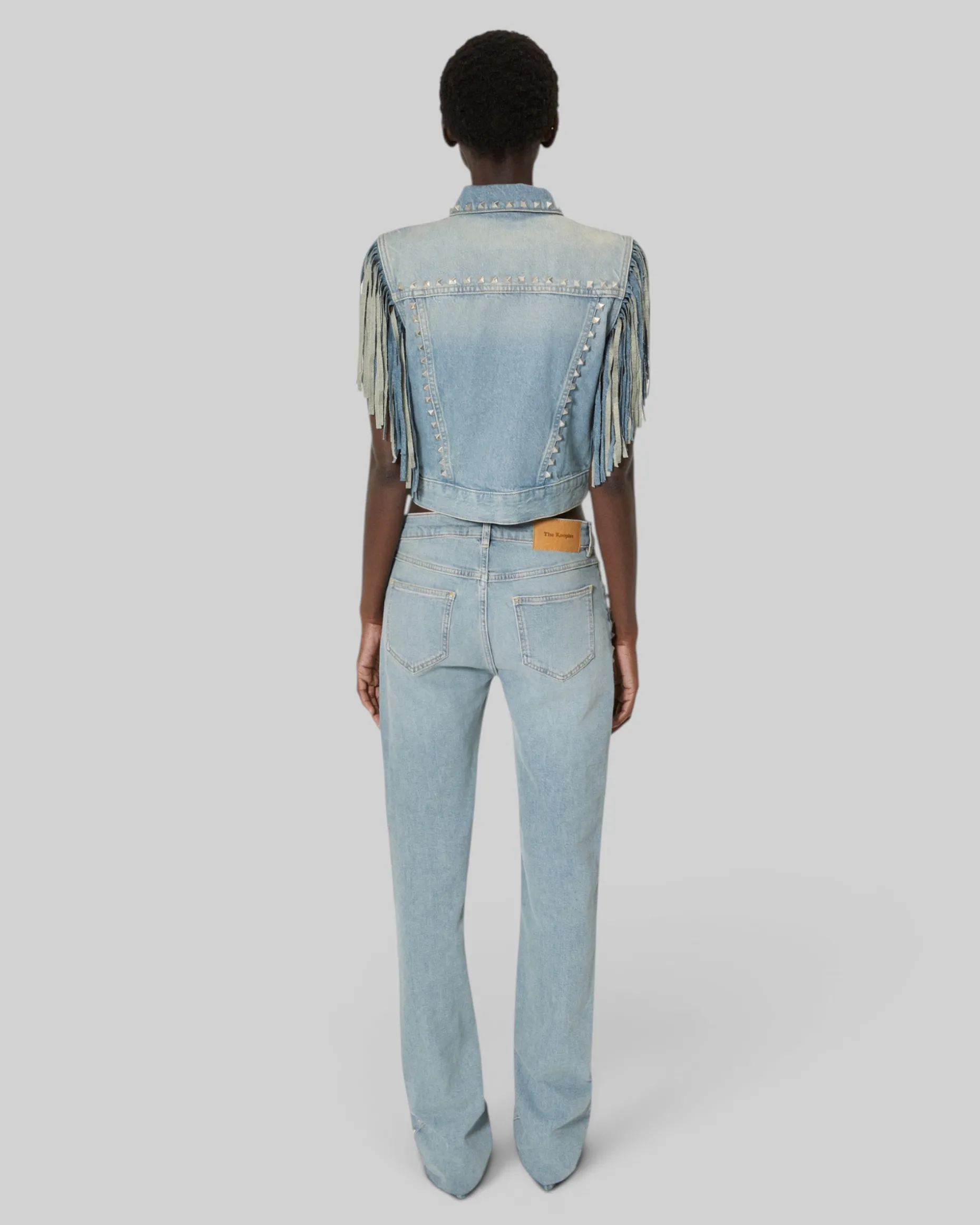 Blouson en denim avec franges et studs bleu