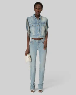 Blouson en denim avec franges et studs bleu