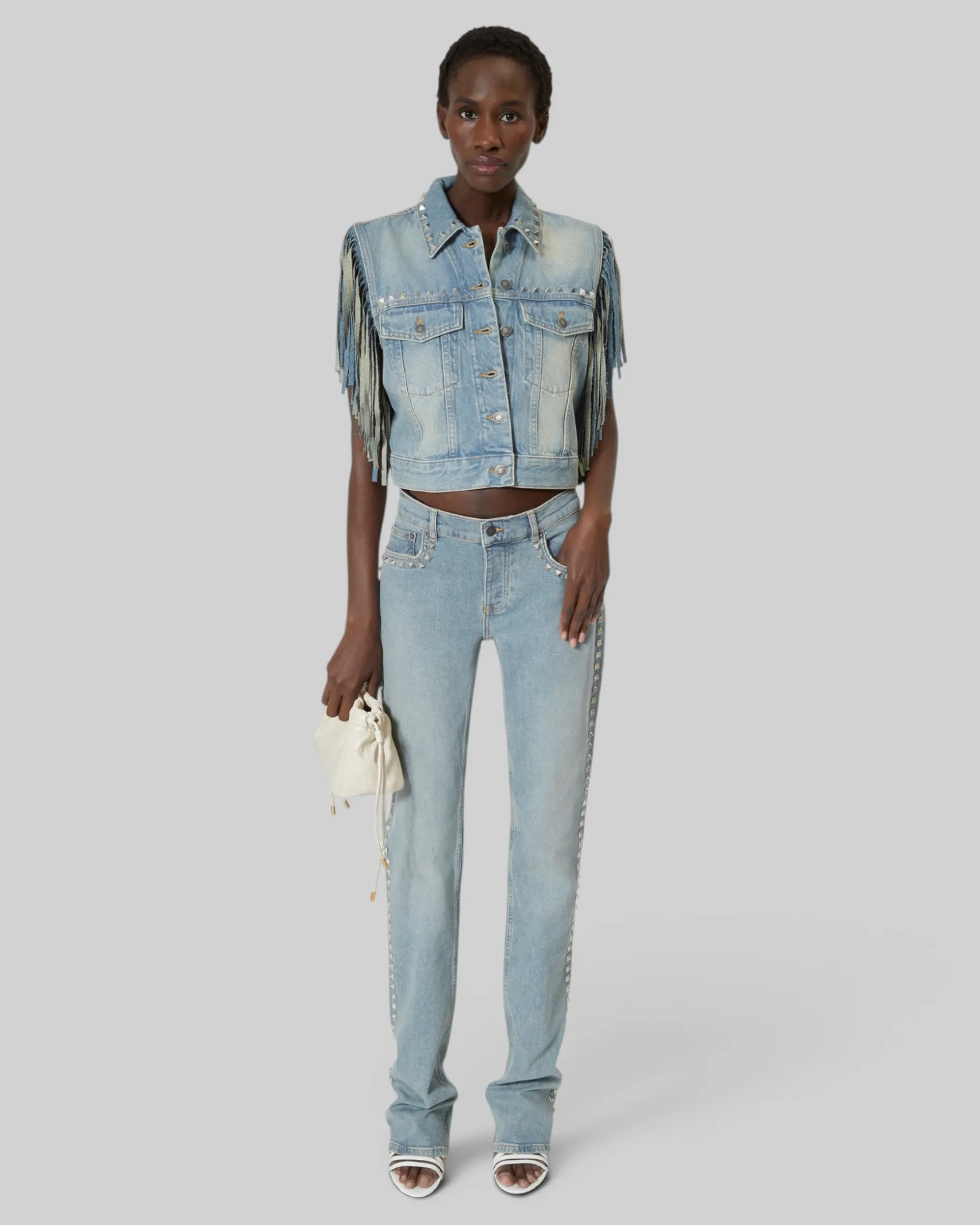 Blouson en denim avec franges et studs bleu