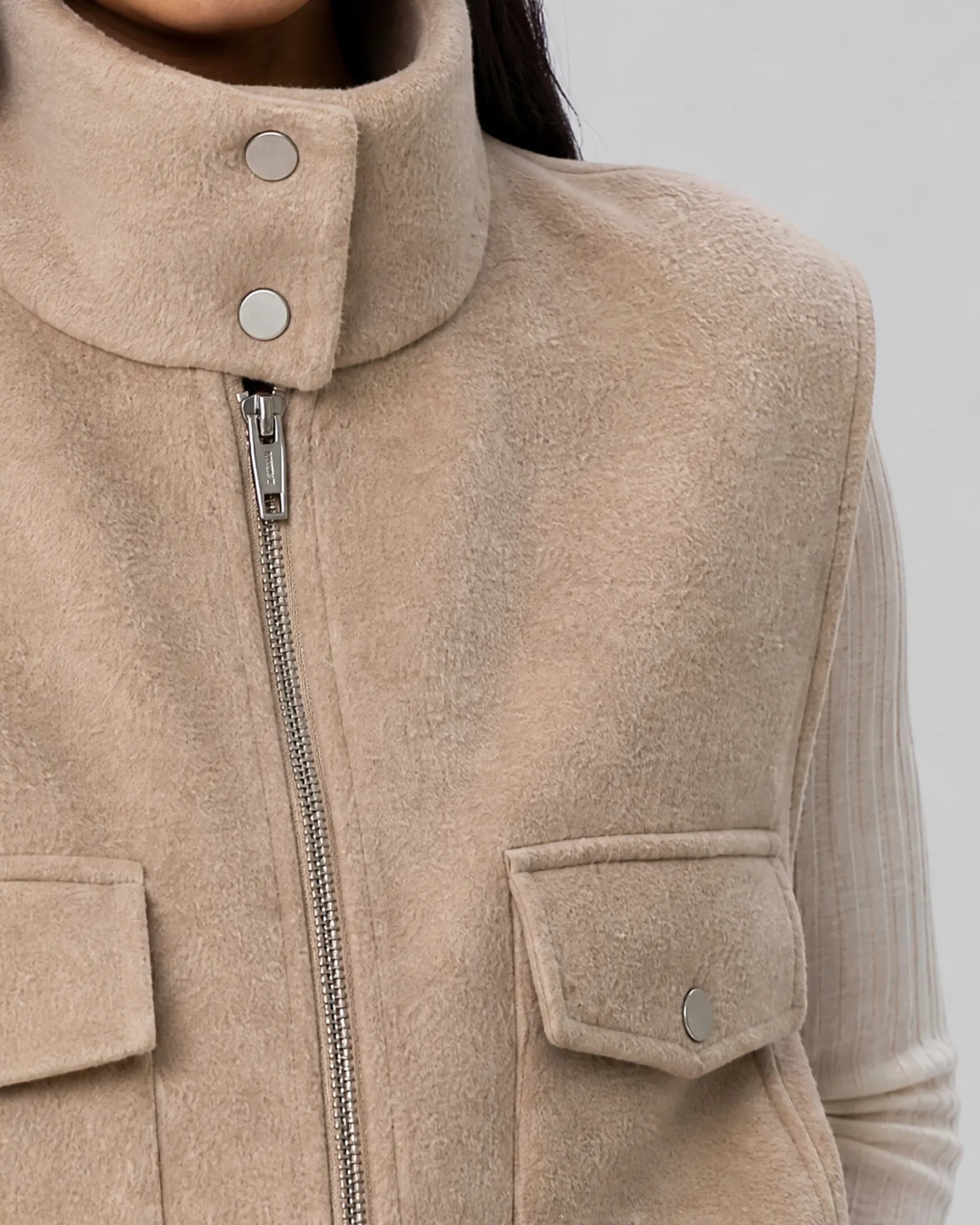 Blouson sans manches en laine double face beige