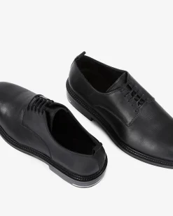 Chaussures à lacets en cuir noires