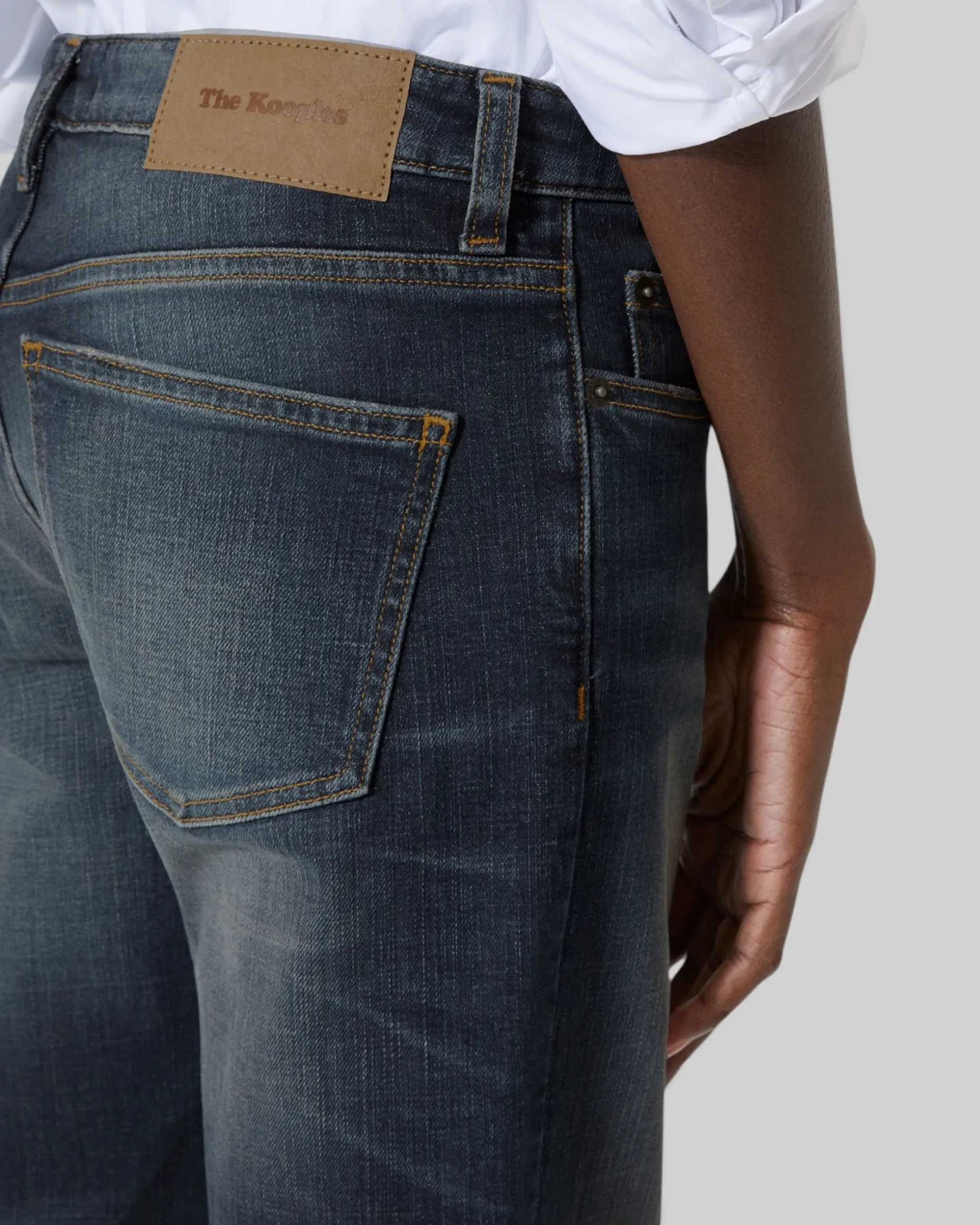 Jean bootcut avec abrasions bleu