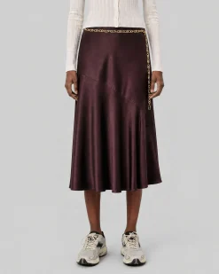 Jupe midi en satin avec chaîne dorée marron