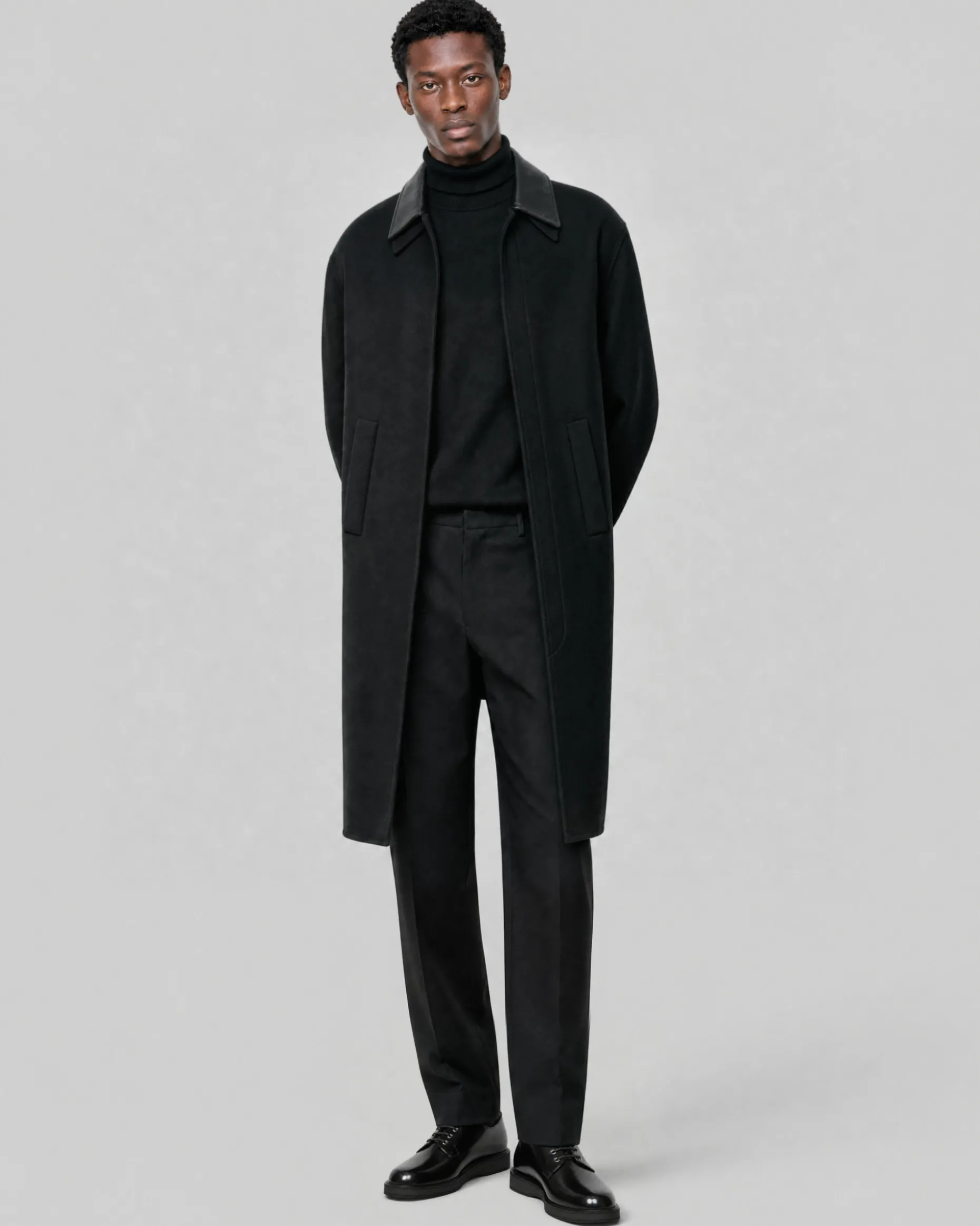 Manteau col cuir noir