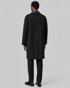Manteau col cuir noir
