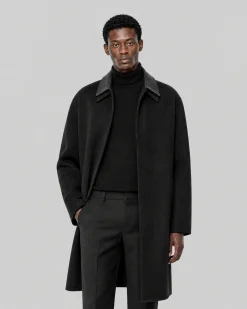 Manteau col cuir noir