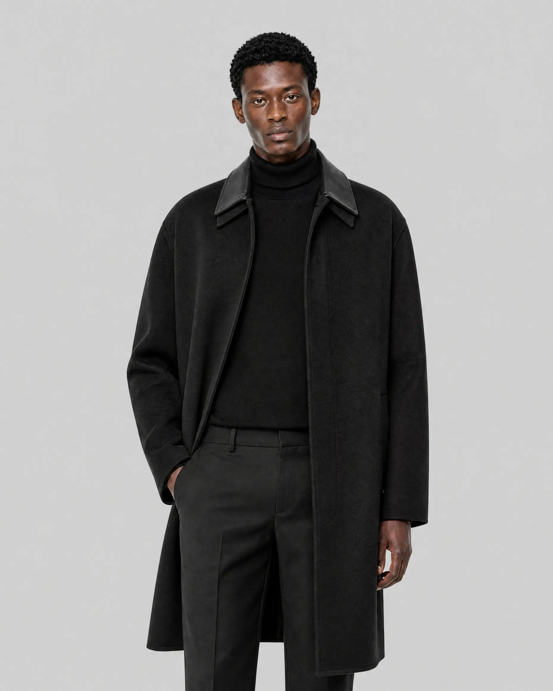 Manteau col cuir noir