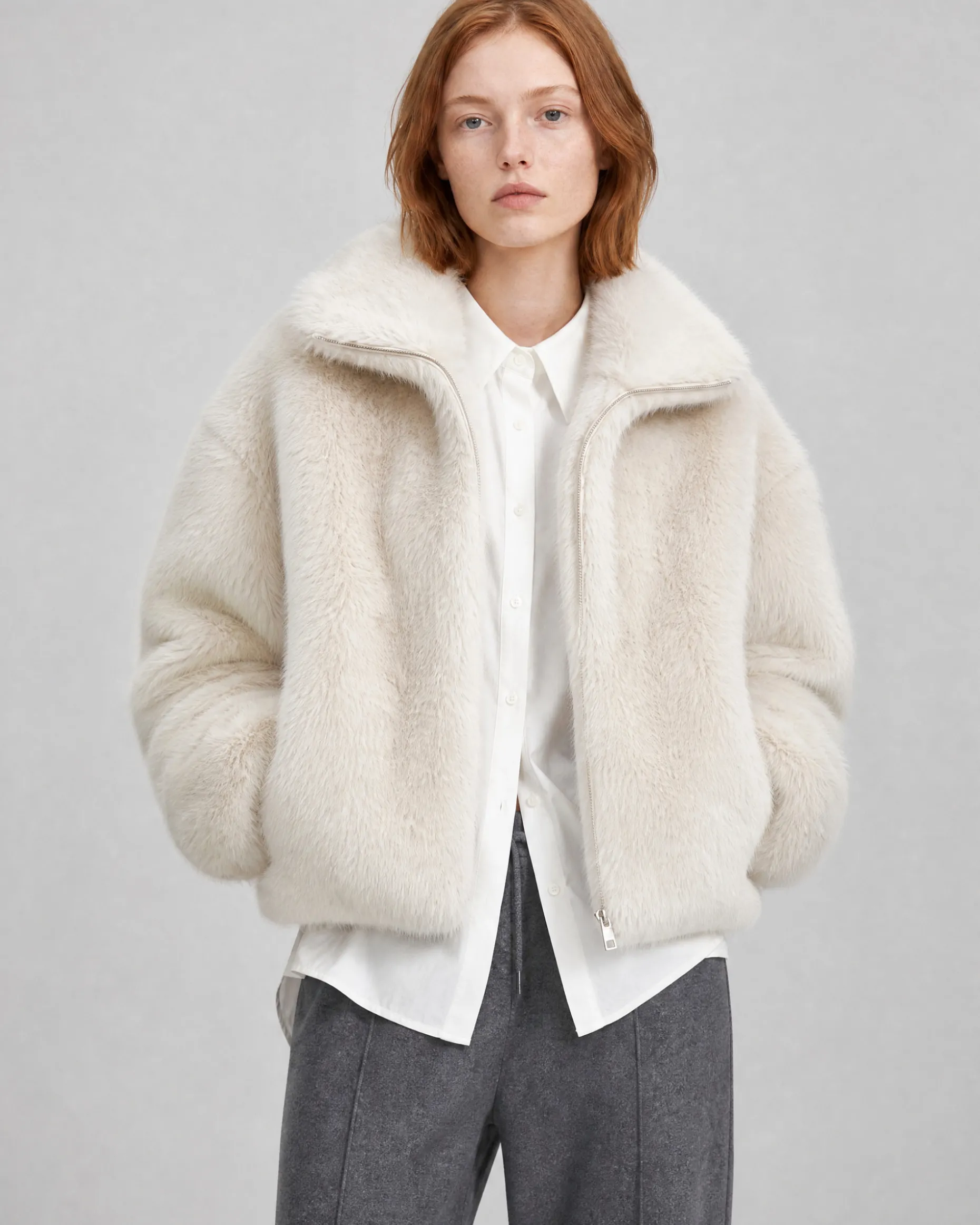 Manteau en fausse fourrure col montant ecru