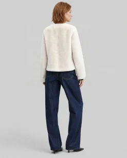 Manteau en fausse fourrure ecru