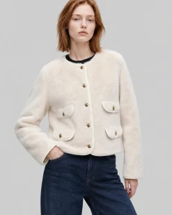 Manteau en fausse fourrure ecru