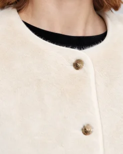 Manteau en fausse fourrure ecru