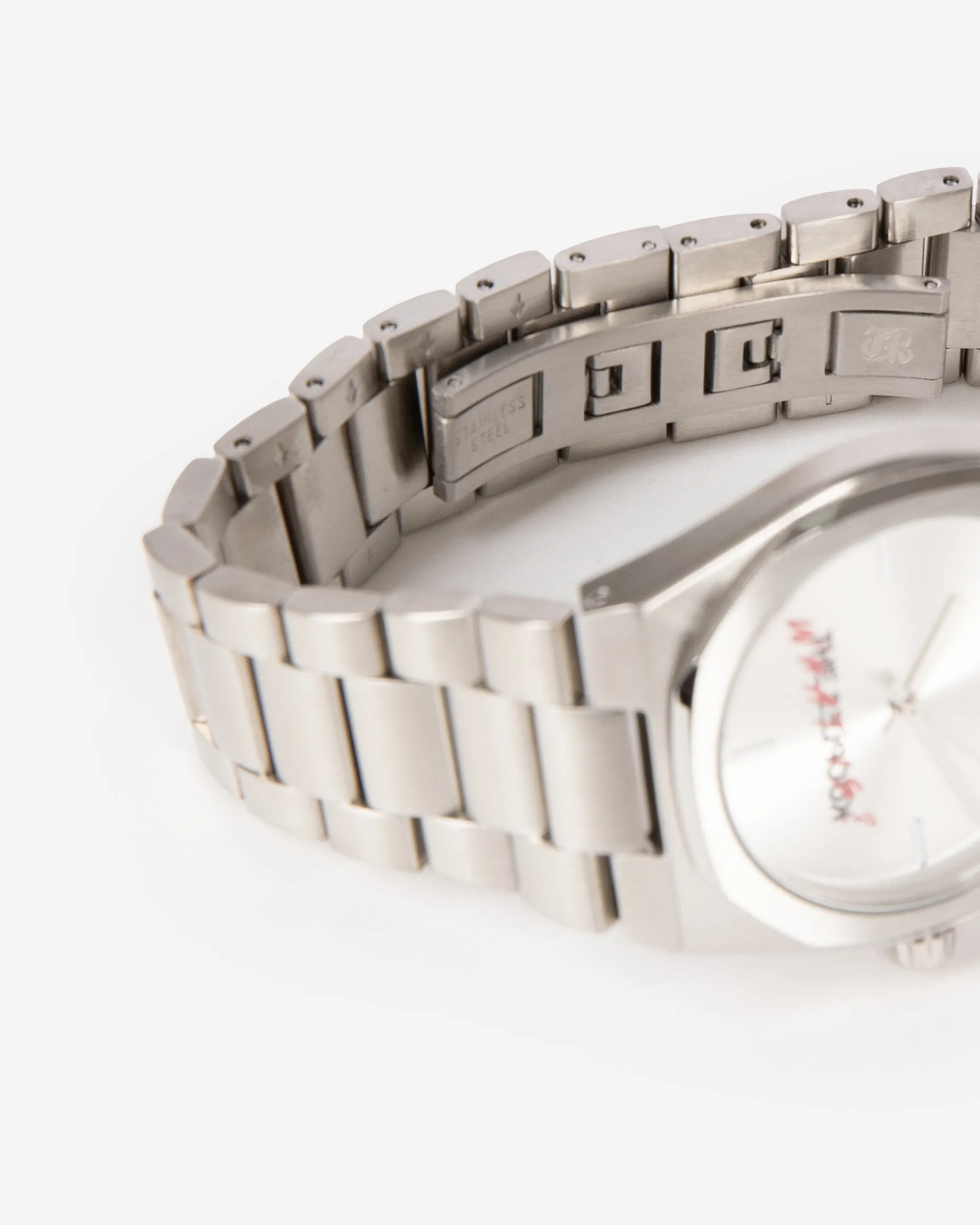 Montre What Is argentée