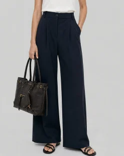 Pantalon de tailleur large en laine mélangée marine