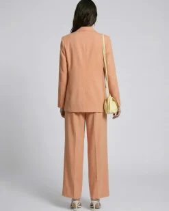 Pantalon de tailleur à pinces large en lin et coton orange clair