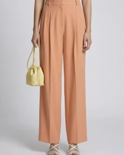 Pantalon de tailleur à pinces large en lin et coton orange clair