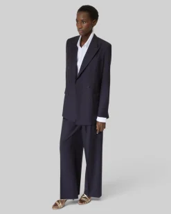 Pantalon tailleur large en laine rayé marine