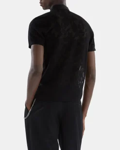Polo en maille effet dentelle noir