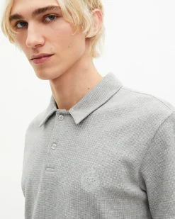 Polo en nid d'abeille avec blason gris