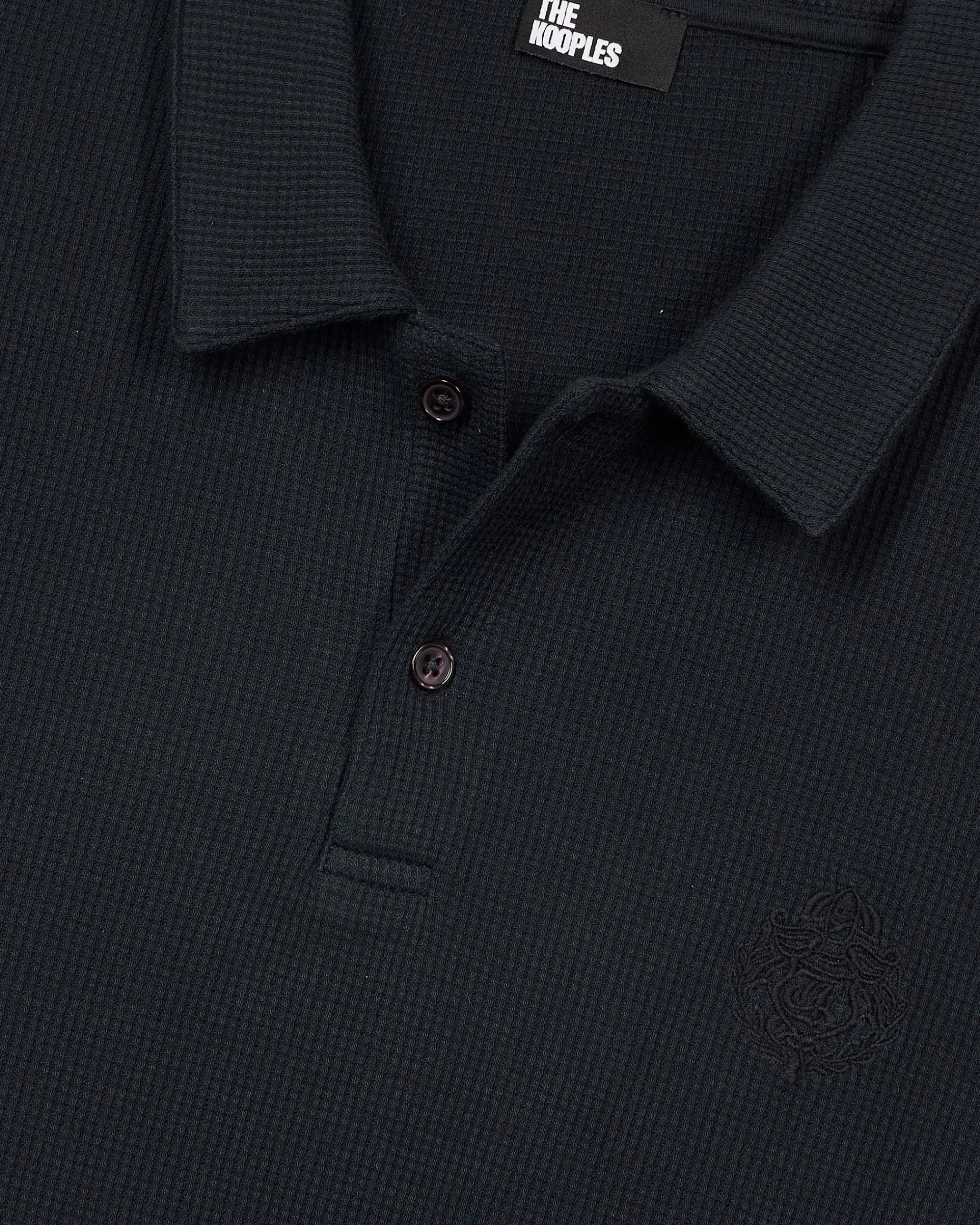 Polo en nid d'abeille avec blason marine