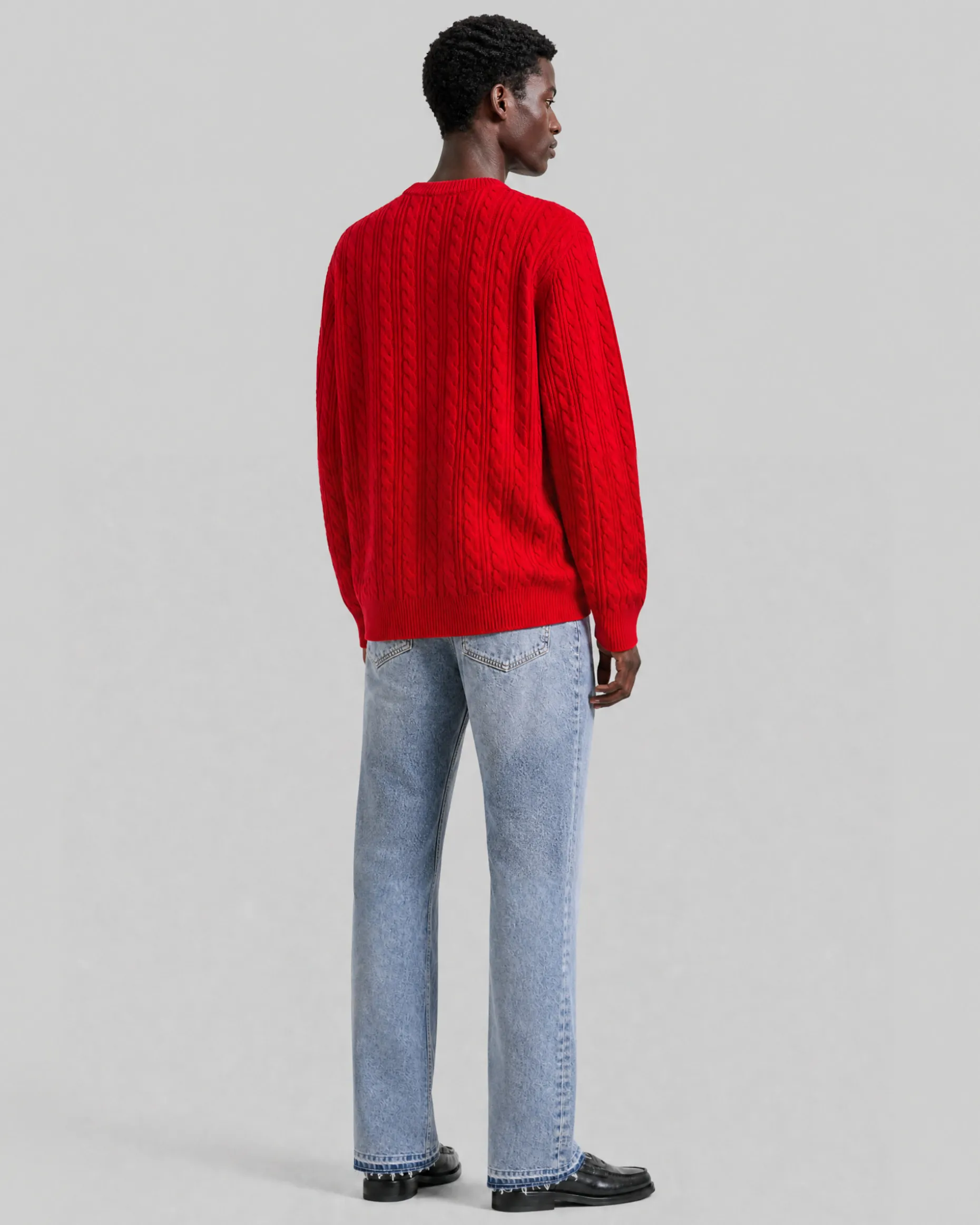 Pull col rond torsadé en laine rouge