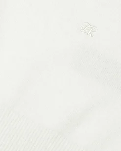 Pull col roulé en cachemire écru