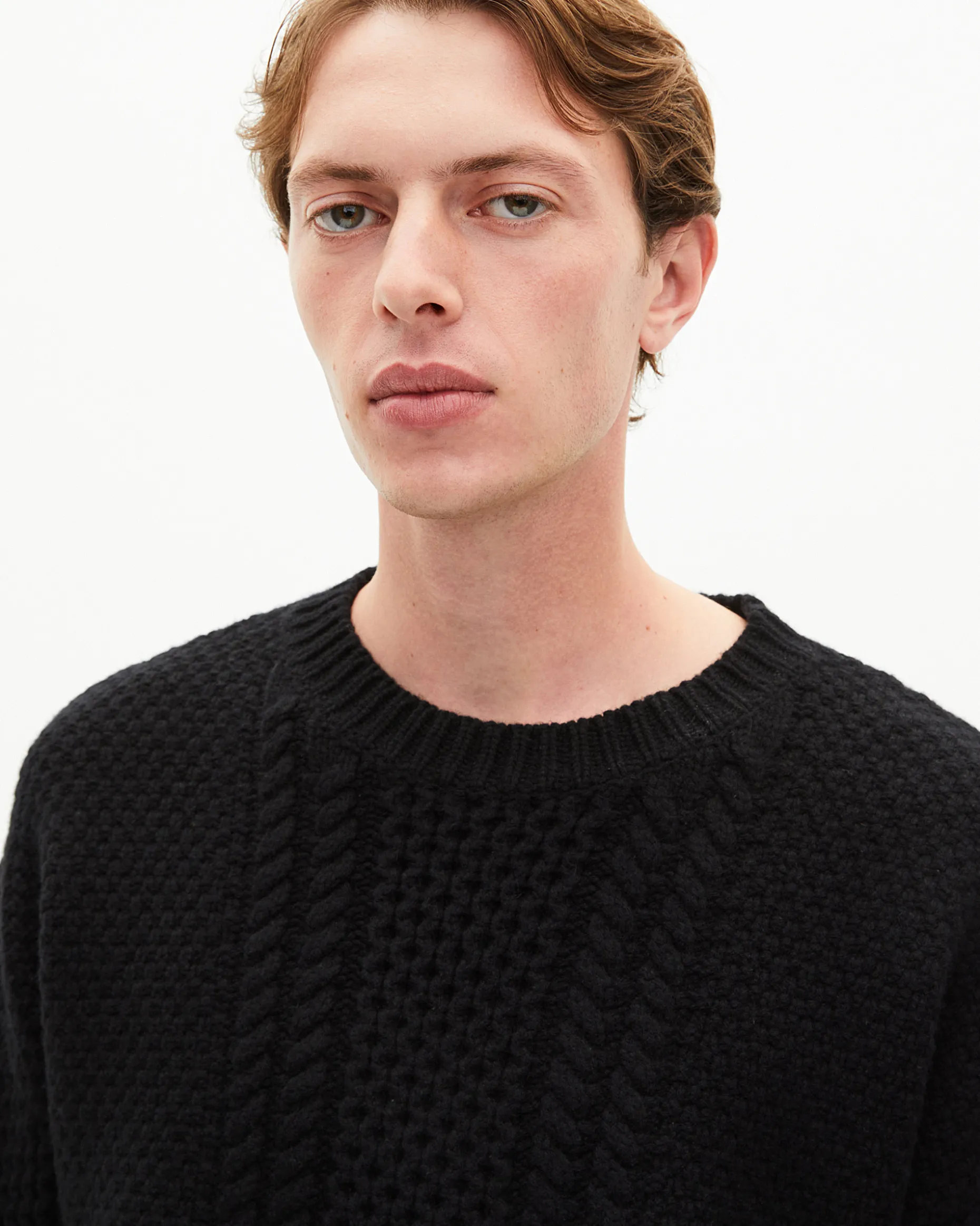 Pull torsadé en laine noir