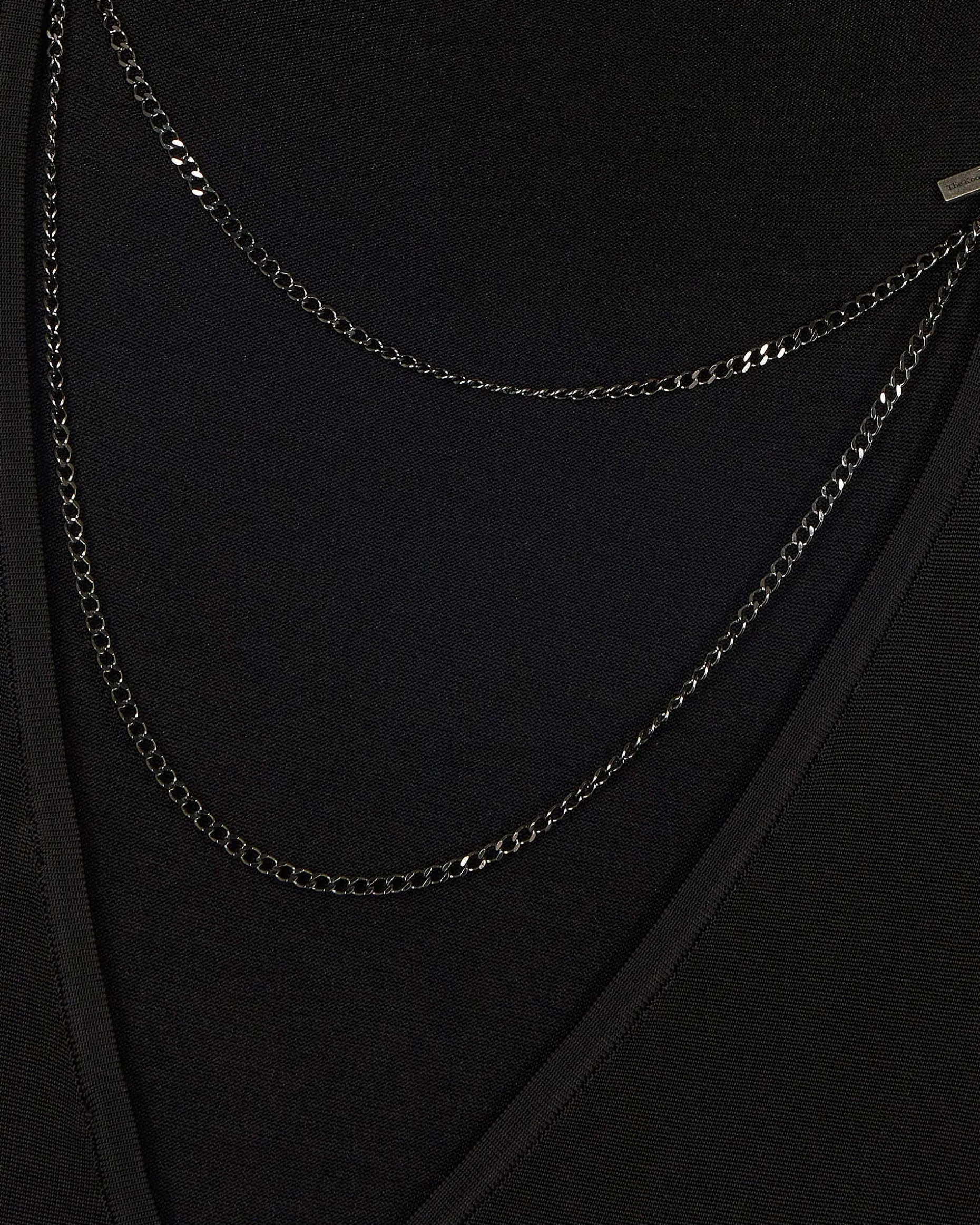 Robe longue en maille avec chaînes dos noire