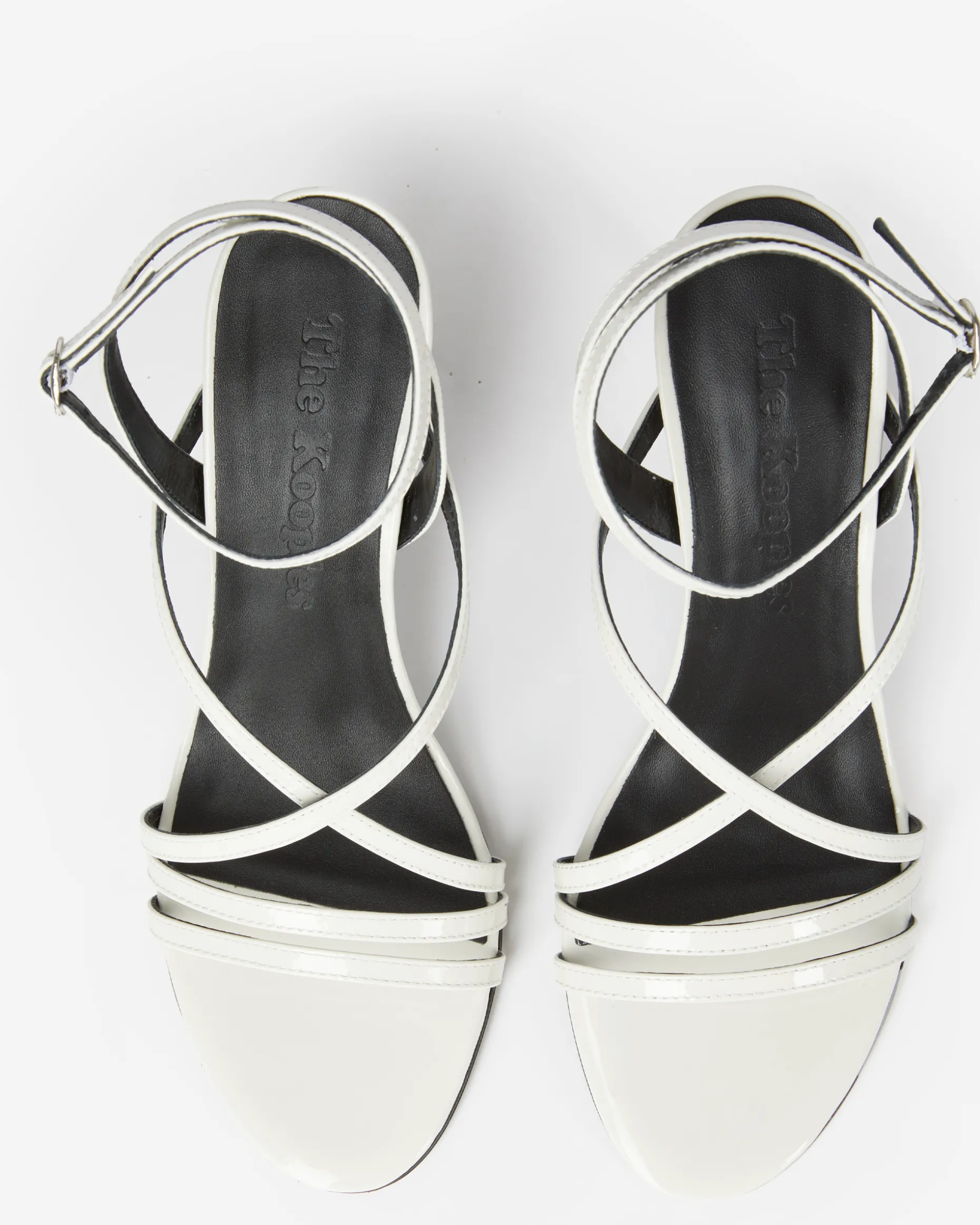 Sandales à talons en cuir vernis blanches