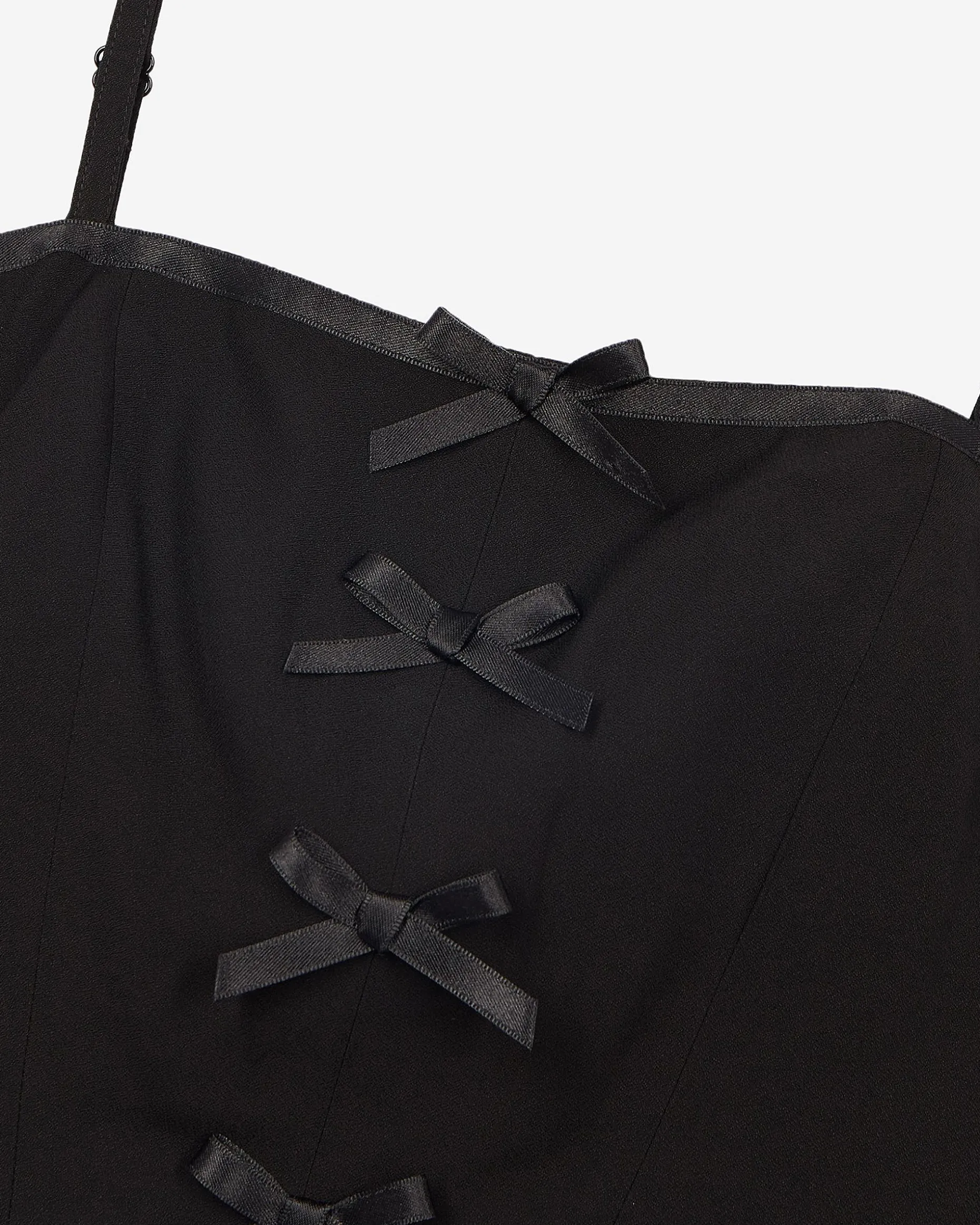 Top avec détails de nœuds noir