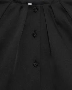 Veste courte effet cape en satin noire